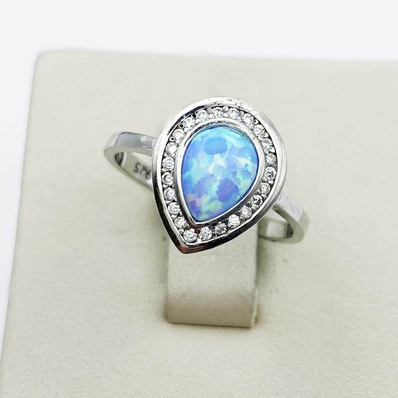 Кольцо серебряное с голубым опалом р. 17 2,48 г (1911756005)