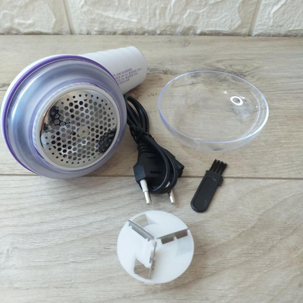 Машинка аккумуляторная Gemei GM-335 для удаления катышек с поворотной ручкой Белый с фиолетовым (KG-10278) - фото 9 Машинка аккумуляторная Gemei GM-335 для удаления катышек с поворотной ручкой Белый с фиолетовым (KG-10278) - фото 9