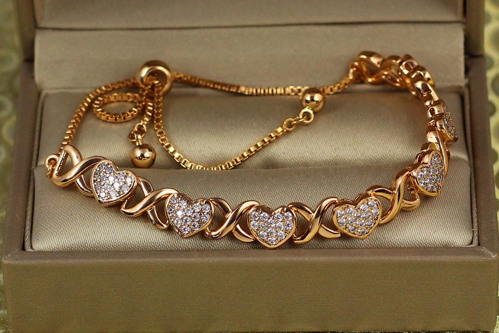 Браслет регулируемый Xuping Jewelry Семь сердец на бегунки Золотистый (2196400707)