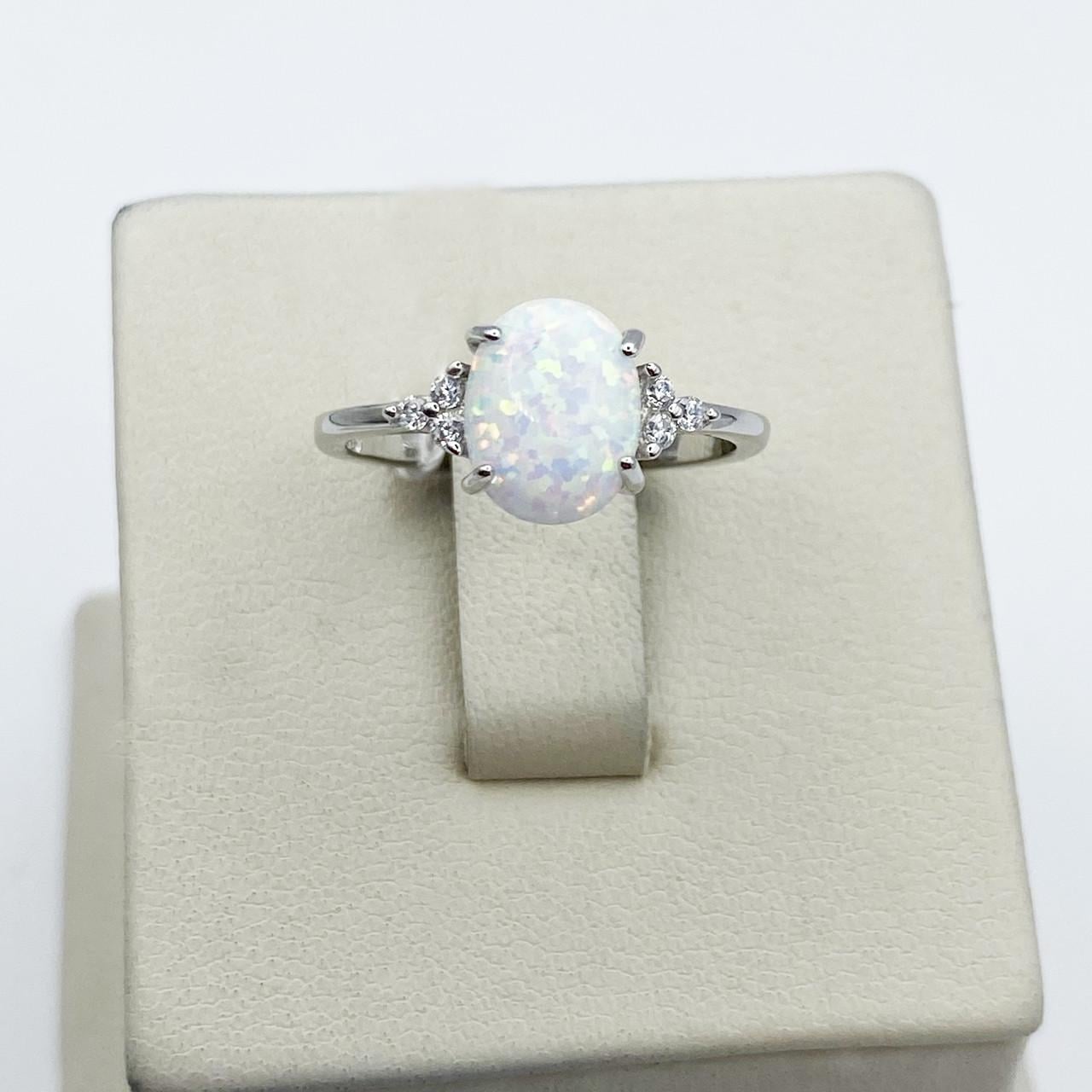 Кольцо серебряное с белым опалом р. 19 1,68 г (2075182242)