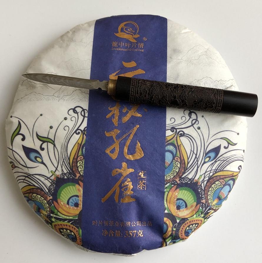 Чай Шен пуэр таинственный облачный павлин расчесанный 2019 год 357 г