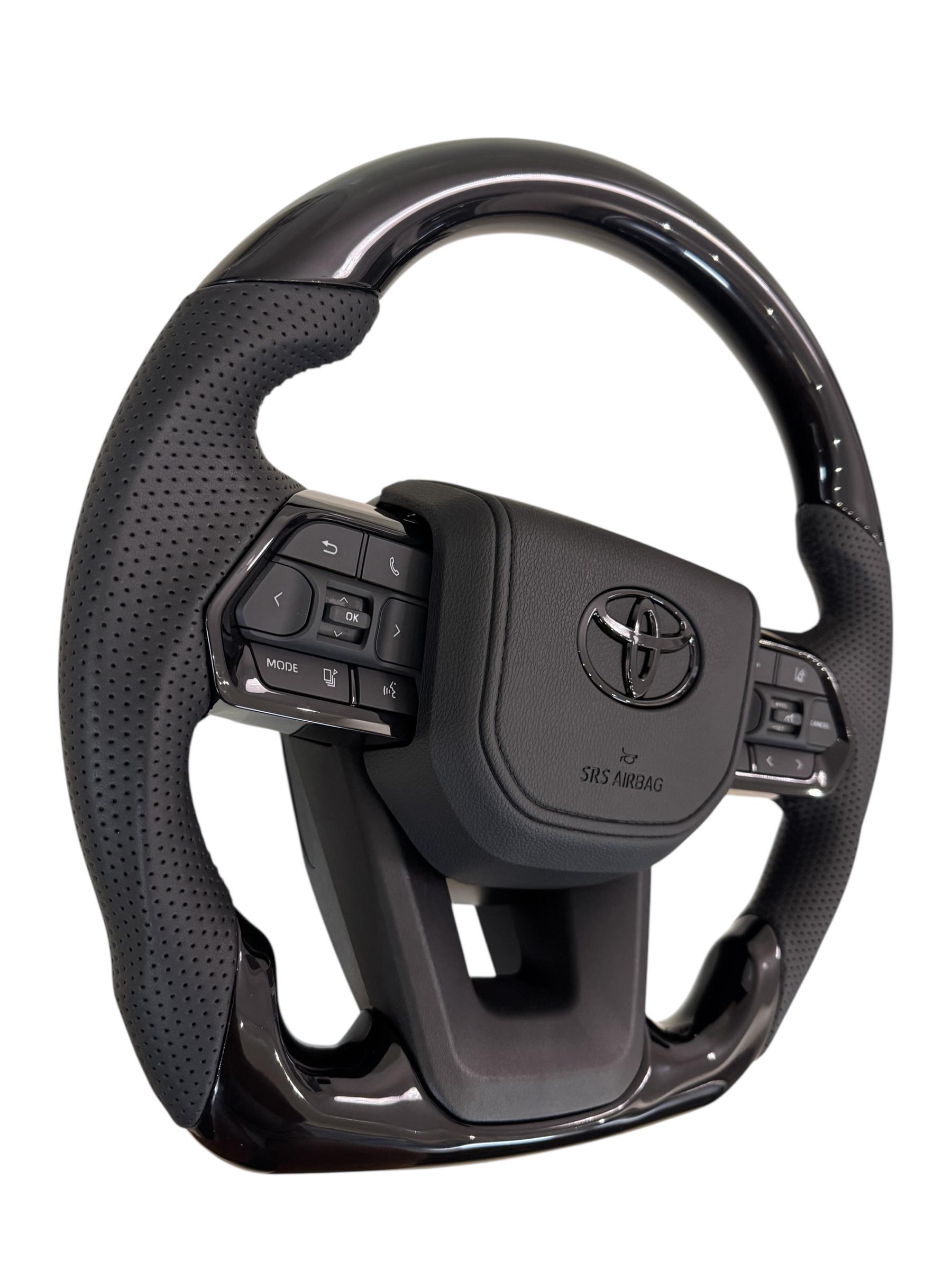 Кермо для Toyota Tundra в сборі рояльний лак зі скошеним низом логотип чорний глянець (29367413) - фото 5 Кермо для Toyota Tundra в сборі рояльний лак зі скошеним низом логотип чорний глянець (29367413) - фото 5