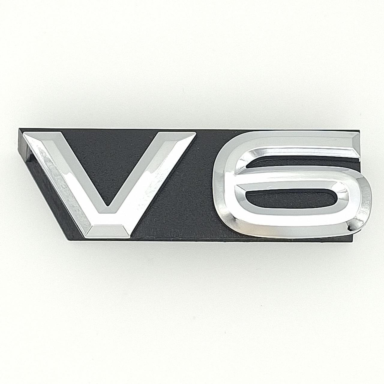Эмблема радиаторной решетки V6 Volkswagen ABS 7,5х2,5 см Хром глянцевый (1670711481)