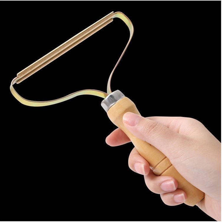 Щітка для видалення катишків з одягу - фото 2 Щітка для видалення катишків з одягу - фото 2