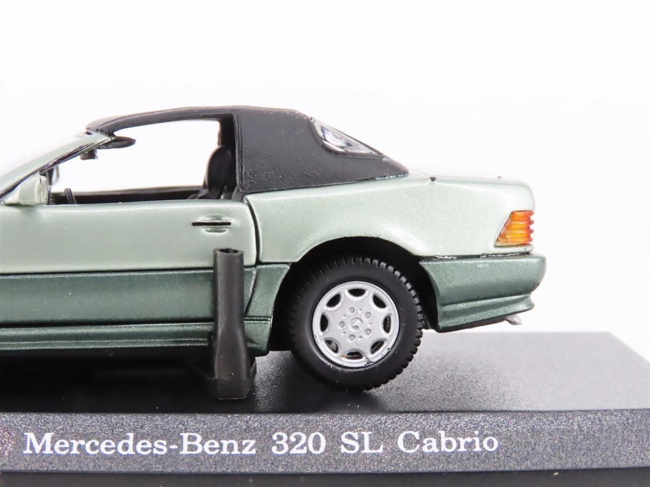 Игрушечная машинка Matchbox Collectibles 1:43 Mercedes 320 SL Soft Top 1990 s Detail Cars Titanium №232 (9DC-232) - фото 4 Игрушечная машинка Matchbox Collectibles 1:43 Mercedes 320 SL Soft Top 1990 s Detail Cars Titanium №232 (9DC-232) - фото 4