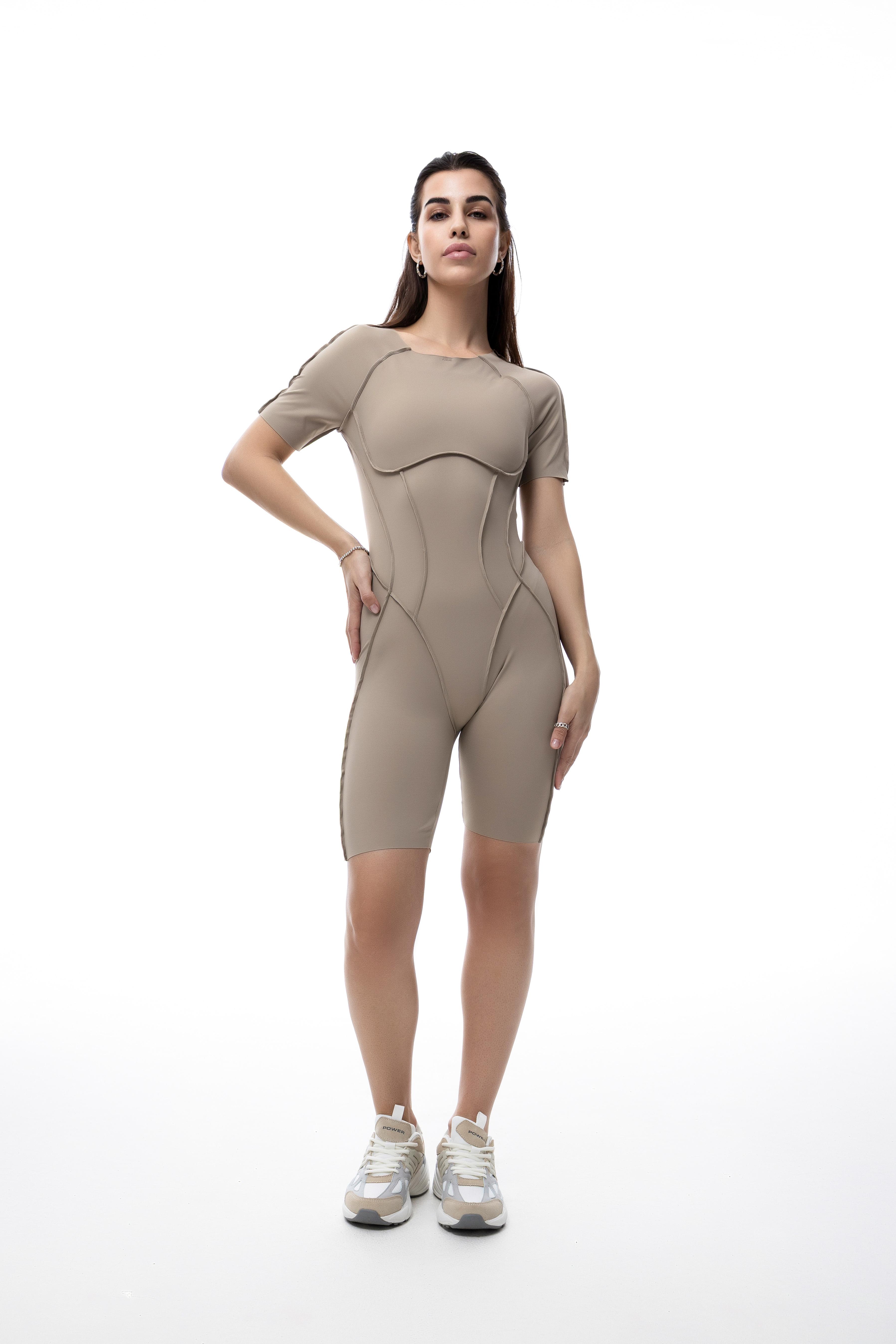 Комбинезон женский спортивный U:na FORMULA S-M Бежевый Комбинезон женский спортивный U:na FORMULA S-M Бежевый