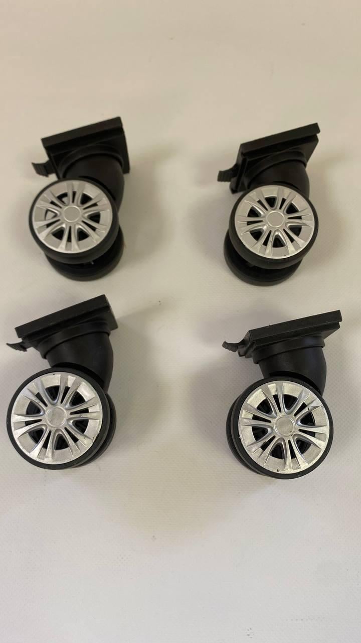 Колеса запасні для дорожньої сумки пластикові 4 шт.