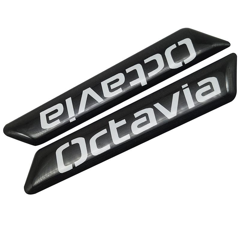 Эмблема на ручку сиденья Octavia (1183203724)
