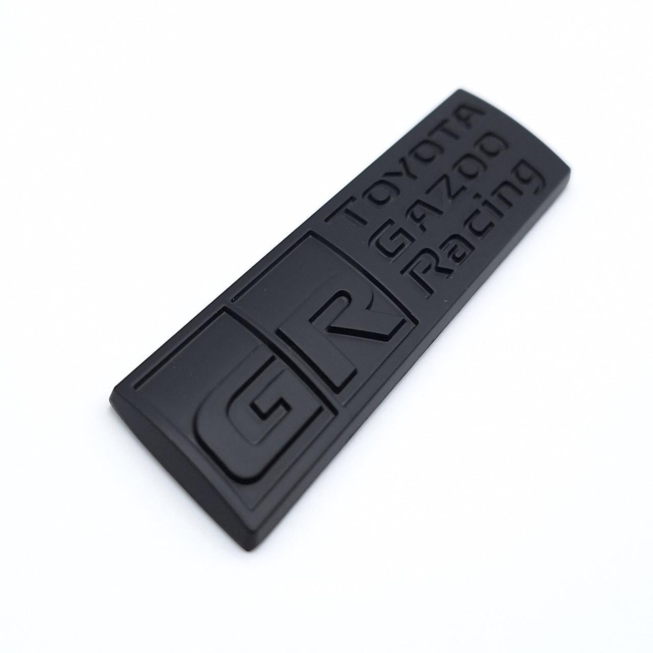Эмблема плашка GR Toyota Gazoo Racing металл 9х2,3 см Черный матовый (2458448737)