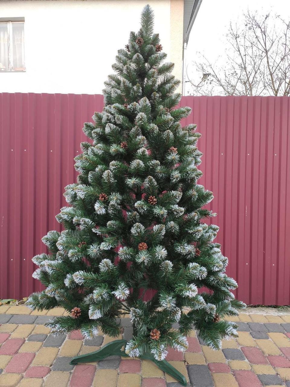 Ялинка штучна Елітна з шишками 250 см з підставкою в коробці (26425008)