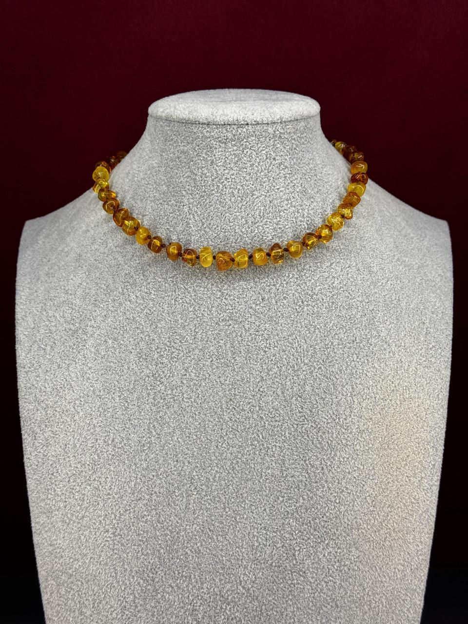 Буси дитячі з бурштину 33 см (у-28)