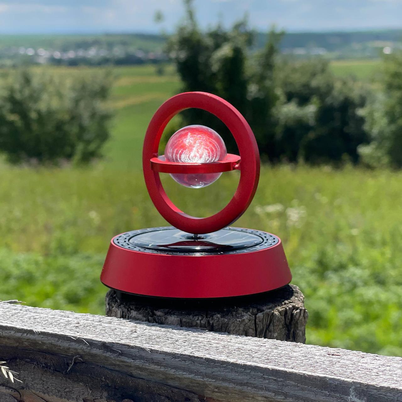 Ароматизатор у машину на сонячній батареї кільця що крутяться