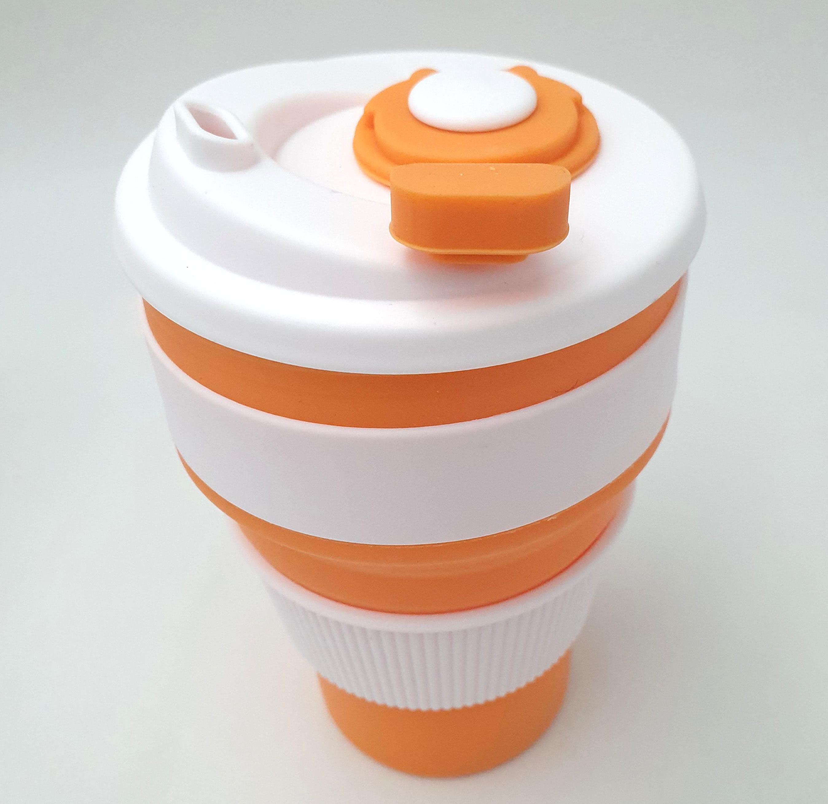 Чашка силиконовая Collapsible складная с герметичной крышкой и поилкой 350 мл Оранжевый - фото 1 Чашка силиконовая Collapsible складная с герметичной крышкой и поилкой 350 мл Оранжевый - фото 1