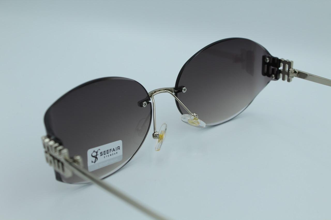 Сонцезахисні окуляри жіночі Seefair (5A003 C8) - фото 8 Сонцезахисні окуляри жіночі Seefair (5A003 C8) - фото 8