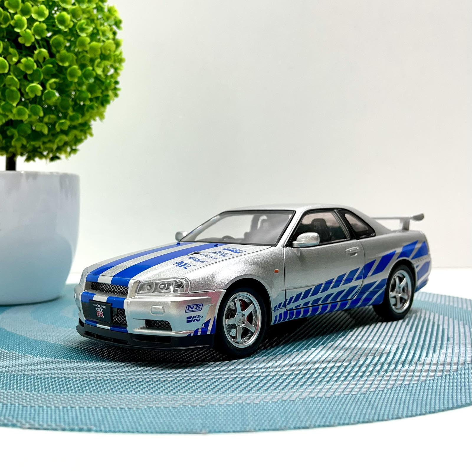 Машинка металлическая Авто Эксперт Nissan GT-R 1:24 свет/звук открывается дверь/капот багажник Серый (1990-21)