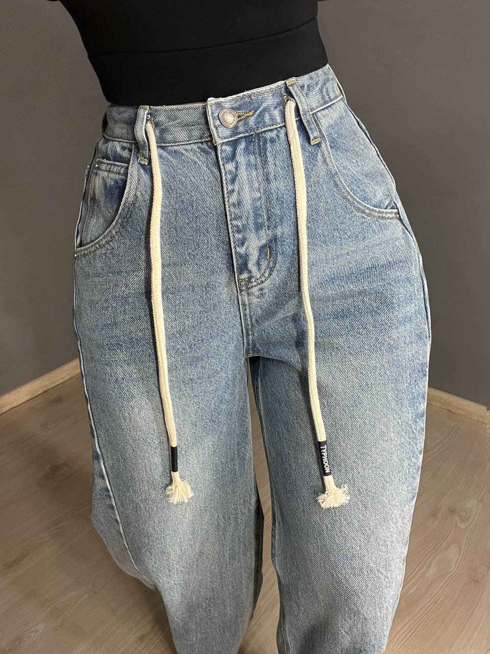 Джинси жіночі Simeile 89616 палаццо широкі зкошений шов попереду висока талія зі шнурком L Блакитний (3539) - фото 5 Джинси жіночі Simeile 89616 палаццо широкі зкошений шов попереду висока талія зі шнурком L Блакитний (3539) - фото 5