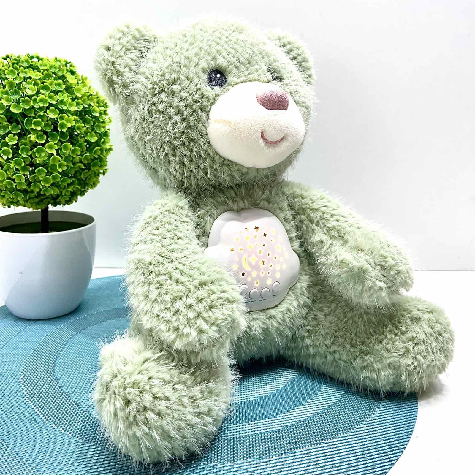 Ночник музыкальный Мишка плюшевый проектор звездного неба цветной/свет/звук 30 см (D1031) Ночник музыкальный Мишка плюшевый проектор звездного неба цветной/свет/звук 30 см (D1031)