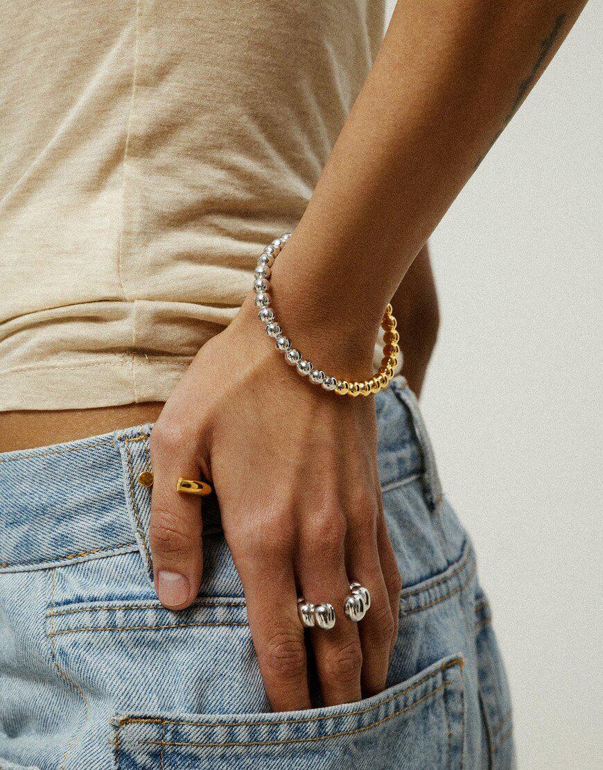 Браслет Puffy біло-жовтий жіночий RIMMART JEWELRY золотий 16 Браслет Puffy біло-жовтий жіночий RIMMART JEWELRY золотий 16
