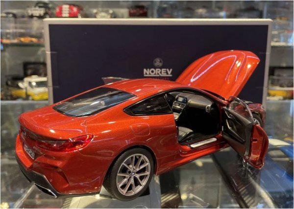Модель автомобиля Norev 1:18 BMW 8 G15 Series Coupe Orange Metallic (183285) - фото 3 Модель автомобиля Norev 1:18 BMW 8 G15 Series Coupe Orange Metallic (183285) - фото 3