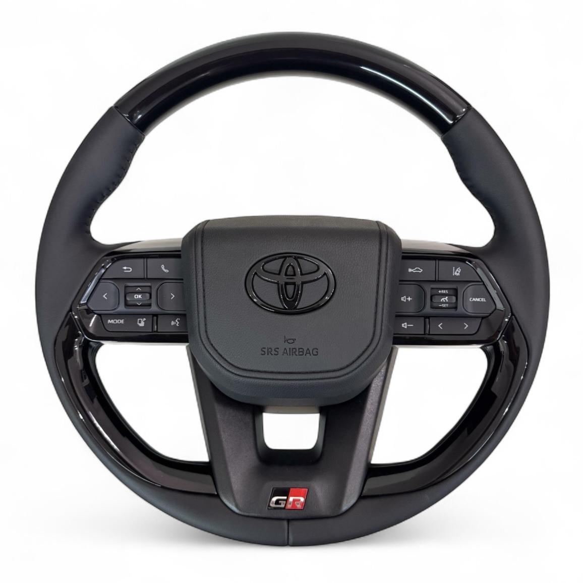 Кермо для Toyota Land Cruiser 200/Prado 150 GR в сборі рояльний лак в стилі LC300 логотип чорний глянець (29621045) Кермо для Toyota Land Cruiser 200/Prado 150 GR в сборі рояльний лак в стилі LC300 логотип чорний глянець (29621045)