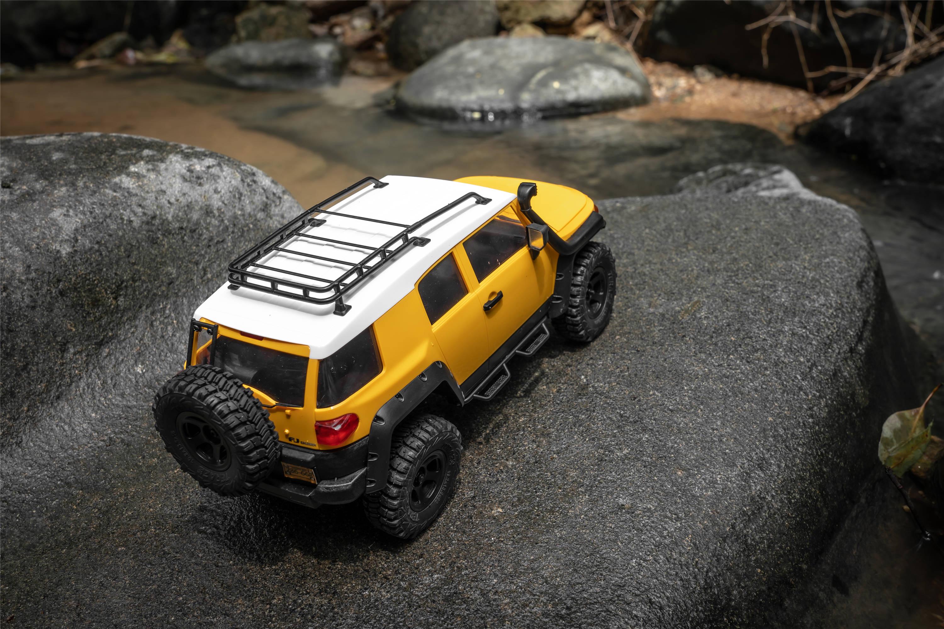 Машинка на радиоуправлении FMS 1:18 FJ Cruiser RTR Yellow - фото 15 Машинка на радиоуправлении FMS 1:18 FJ Cruiser RTR Yellow - фото 15