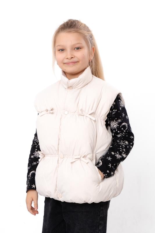 Жилетка для дівчинки з декоративними бантиками Носи Своє 150 см Бежевий (17355) Жилетка для дівчинки з декоративними бантиками Носи Своє 150 см Бежевий (17355)