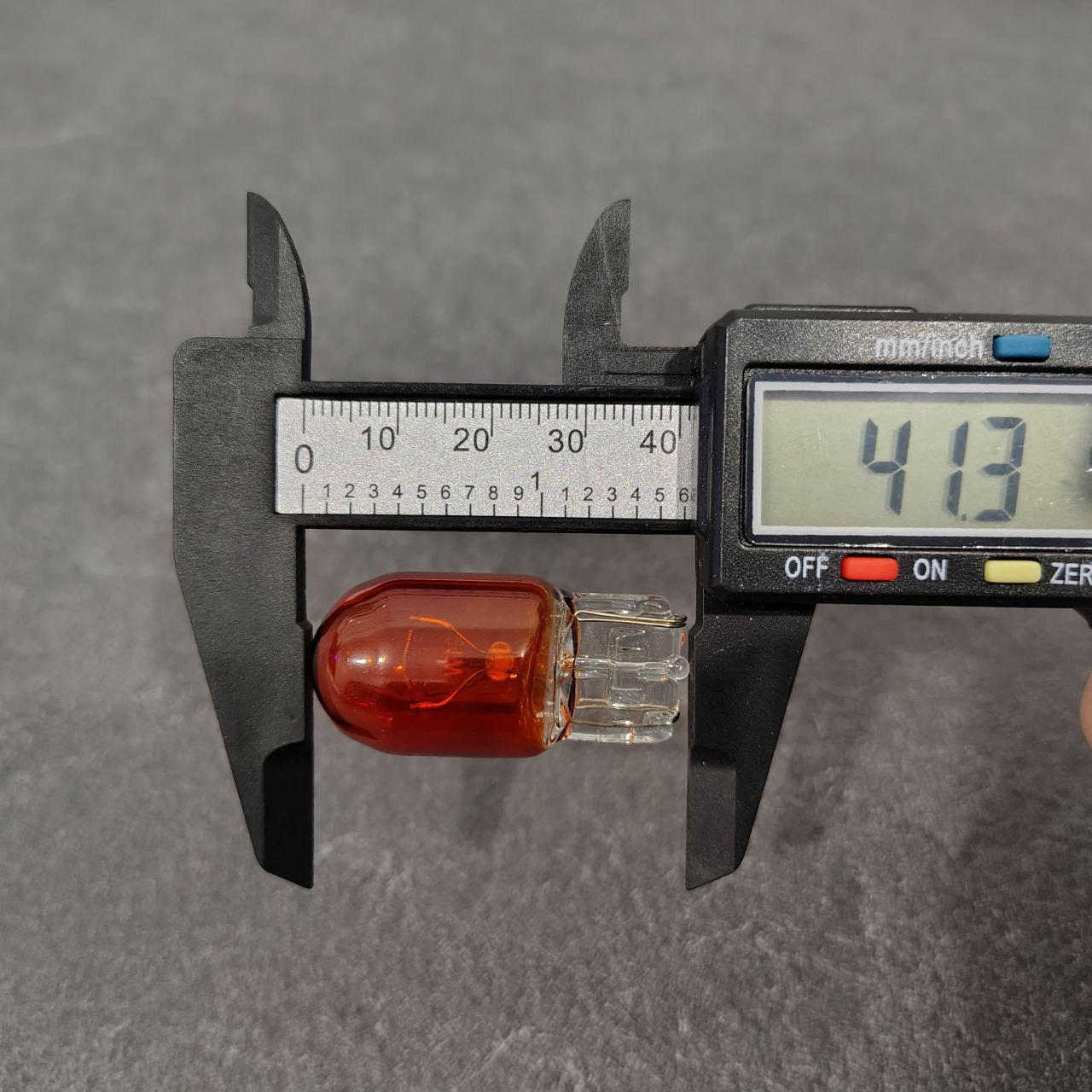 Автолампа T20 WY21W WX3x16d 12V 21W Бурштиновий (652STORE3) - фото 3 Автолампа T20 WY21W WX3x16d 12V 21W Бурштиновий (652STORE3) - фото 3