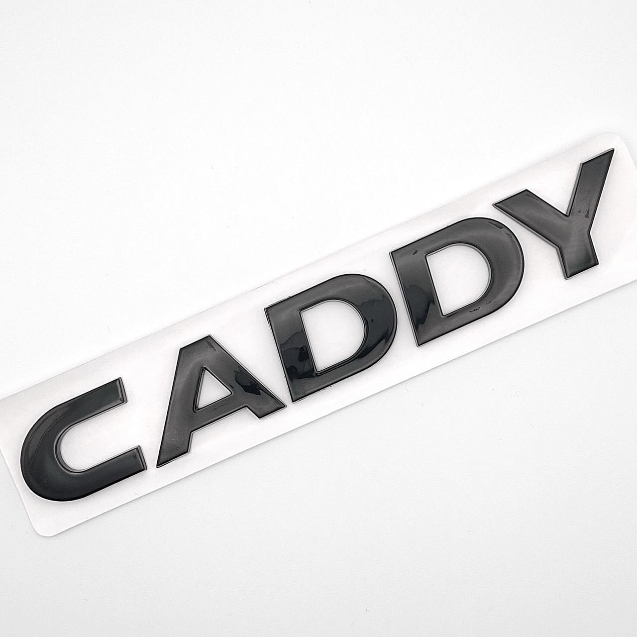 Эмблема надпись Caddy Volkswagen ABS 15,5х2,3 см Черный глянцевый (2772092166)