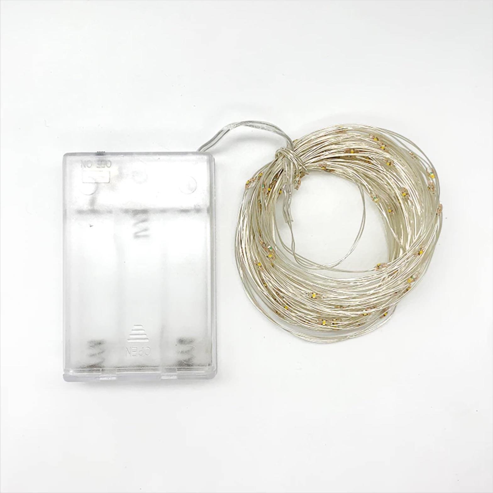 Гирлянда светодиодная новогодняя Роса 50 LED на батарейках 5 м Теплый Белый (150-41-Роса 1977-07) - фото 4 Гирлянда светодиодная новогодняя Роса 50 LED на батарейках 5 м Теплый Белый (150-41-Роса 1977-07) - фото 4