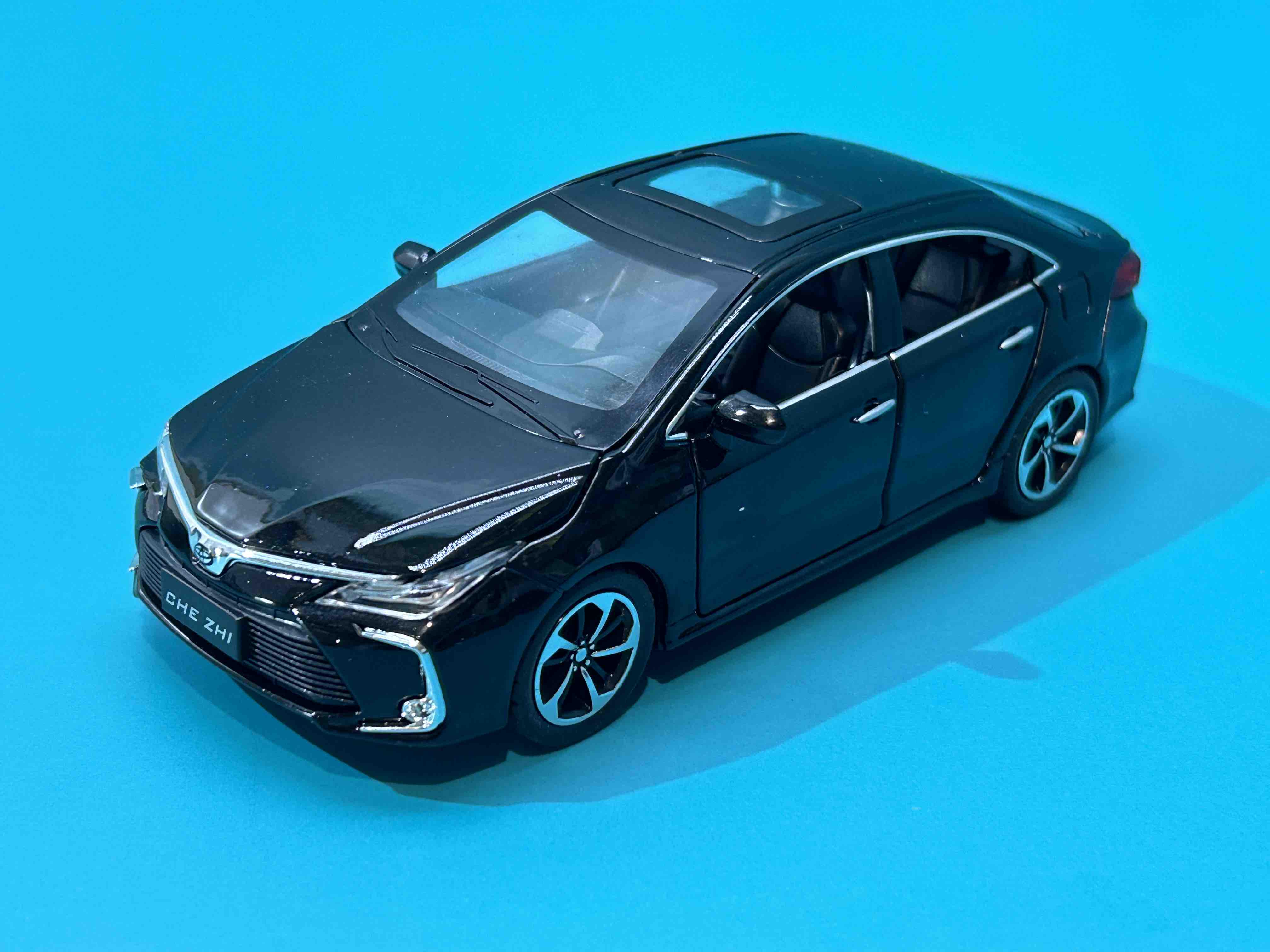 Машинка металлическая TK Union Group Авто Эксперт Toyota Corolla 1:32 металлическая свет/звук Черный (GT-6258)
