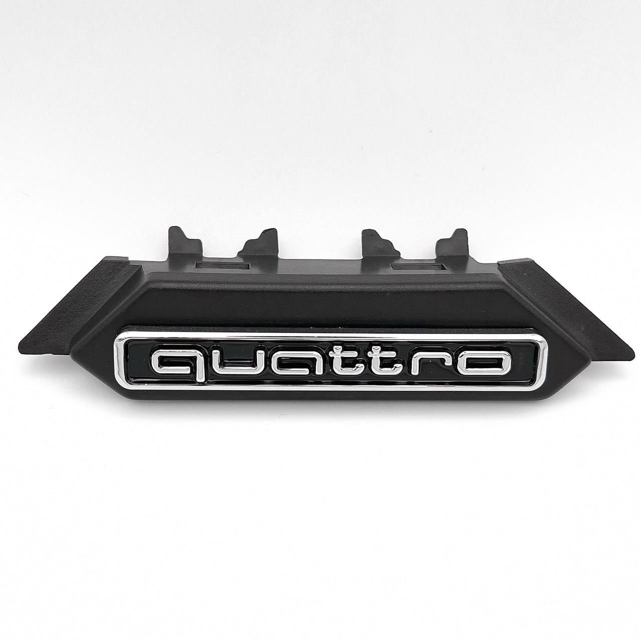 Эмблема радиаторной решетки Quattro Audi 90х20 мм Хром/Черный (A4 B9)