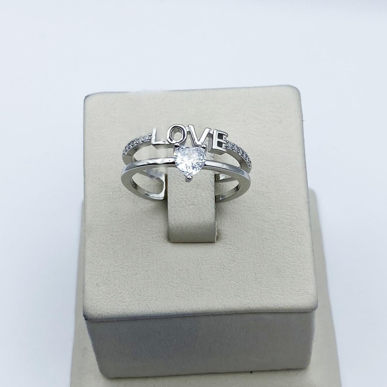 Каблучка срібна з кубічним цирконієм LOVE р. 18 2,86 г (2103604837) Каблучка срібна з кубічним цирконієм LOVE р. 18 2,86 г (2103604837)