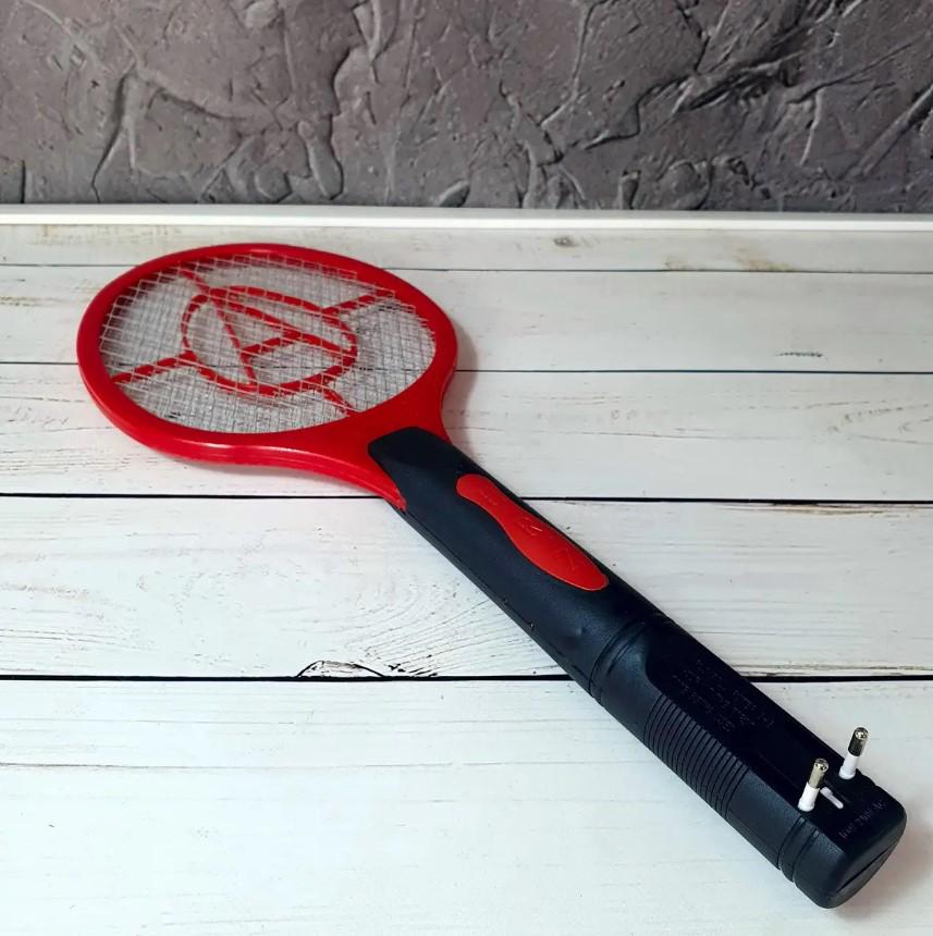 Мухобійка-ракетка електрична Annihilator від комарів і мух на акумуляторі від мережі 220В Червоний (7G-F-7433R) - фото 7 Мухобійка-ракетка електрична Annihilator від комарів і мух на акумуляторі від мережі 220В Червоний (7G-F-7433R) - фото 7