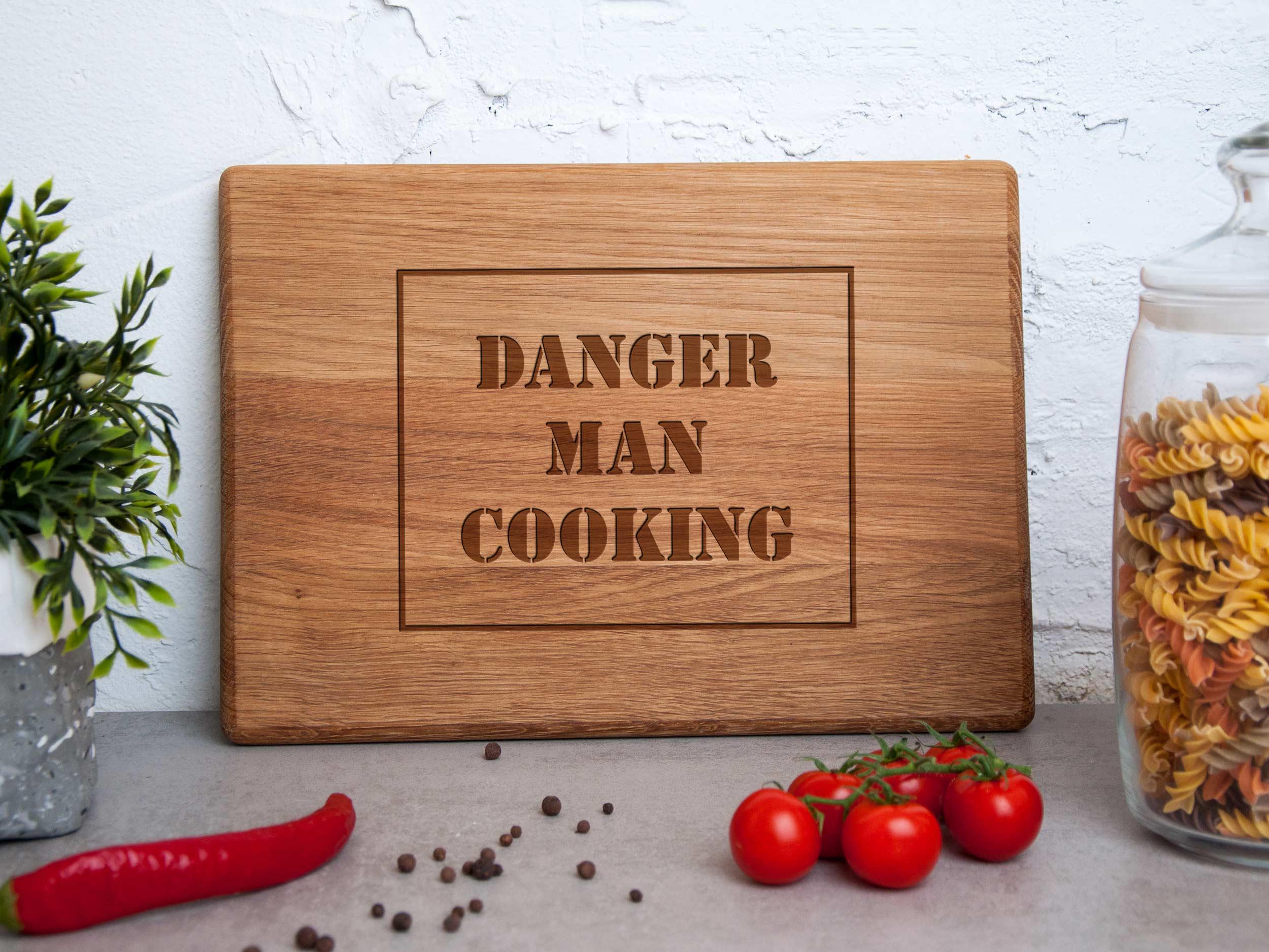 Разделочная доска WoodPresentStudio "Danger man cooking" 30х45 см