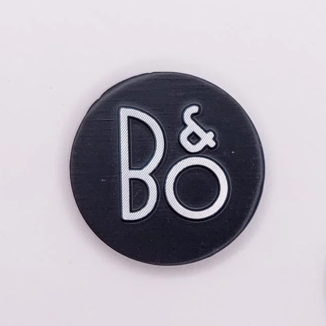 Эмблема Bang&Olufsen на сетку динамика 1,6х1,6 см (1759773132)