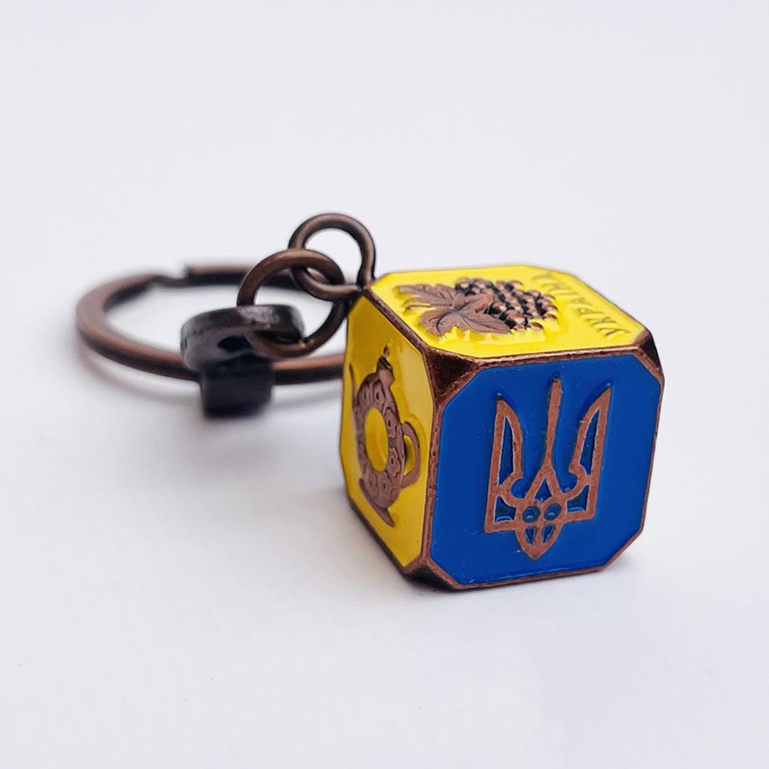 Брелок металевий SMG Україна Символи кубик Бронза
