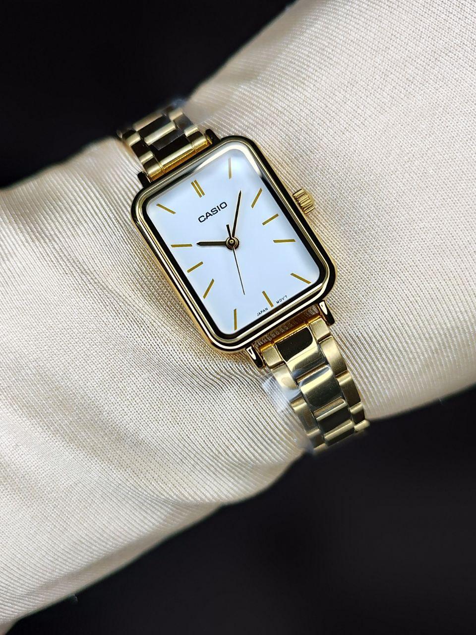Наручний годинник жіночий Casio LTP-V009G-7E Lady Timeless Collection Білий (2700843297)