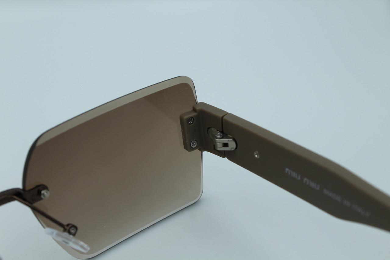 Сонцезахисні окуляри жіночі дизайнерські (58094 №1) - фото 9 Сонцезахисні окуляри жіночі дизайнерські (58094 №1) - фото 9