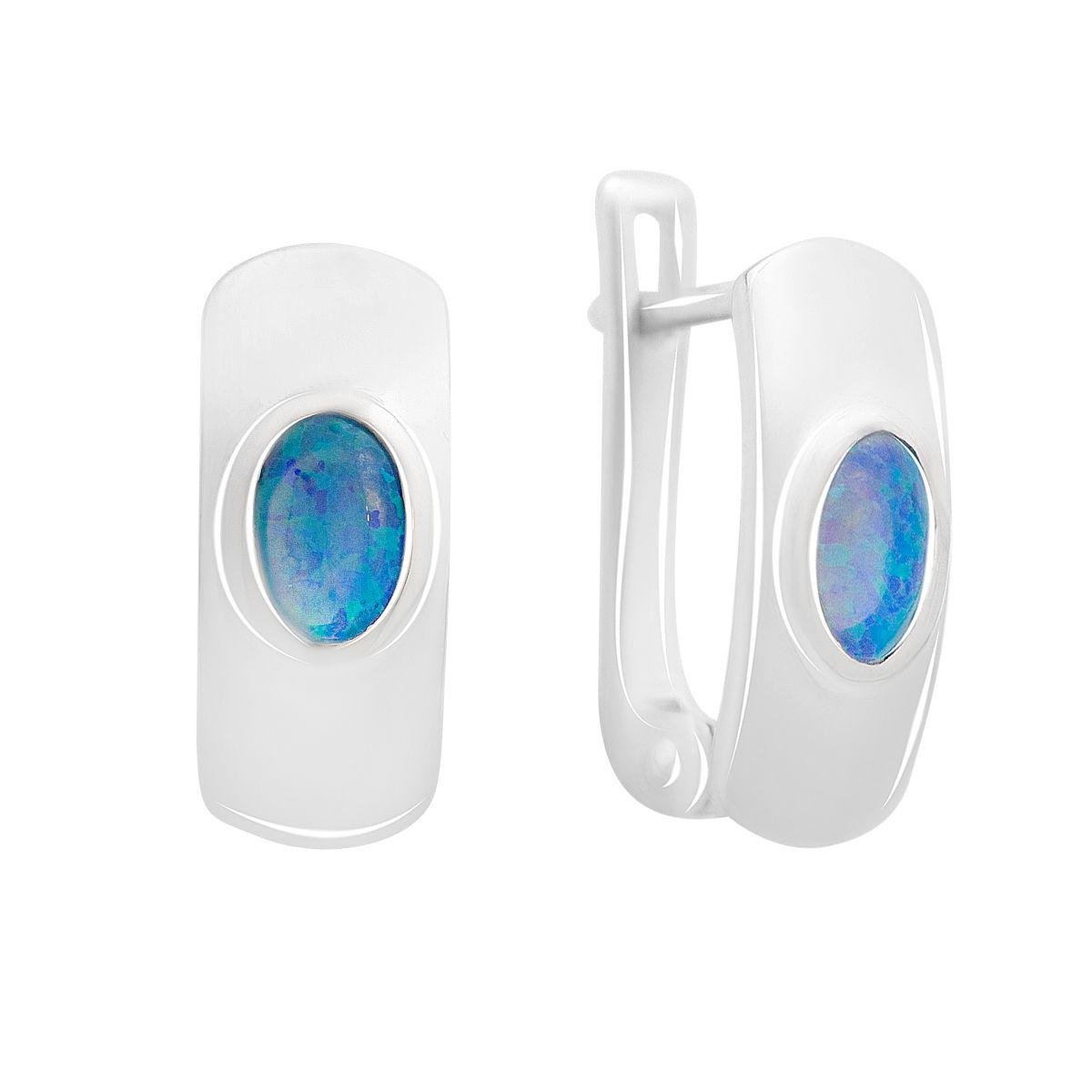 Сережки срібні з натуральним опалом в овальній оправі Сережки срібні з натуральним опалом в овальній оправі