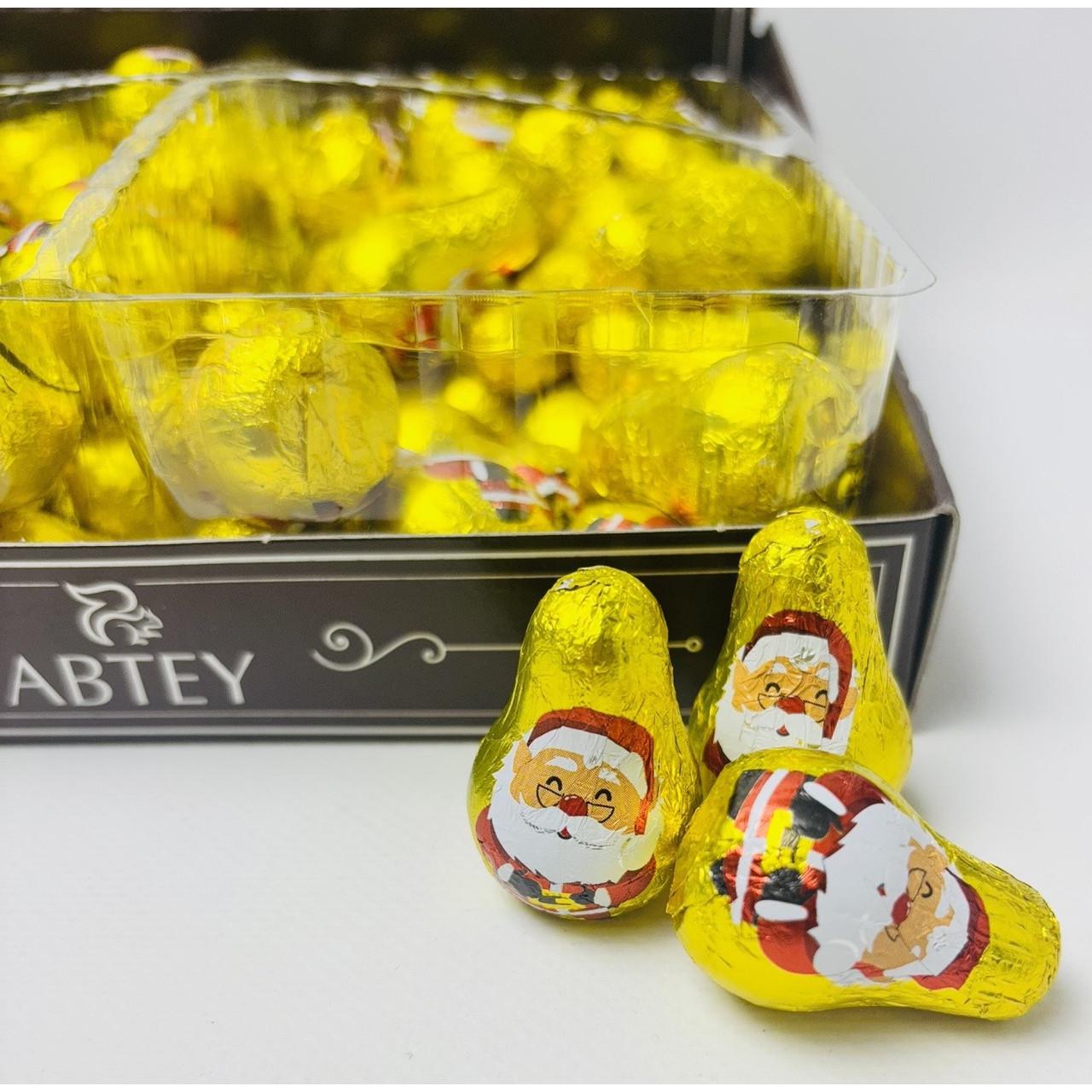 Цукерки Abtey Les P'tits Peres-Noel праліне у молочному шоколаді 84x12 г - фото 2 Цукерки Abtey Les P'tits Peres-Noel праліне у молочному шоколаді 84x12 г - фото 2