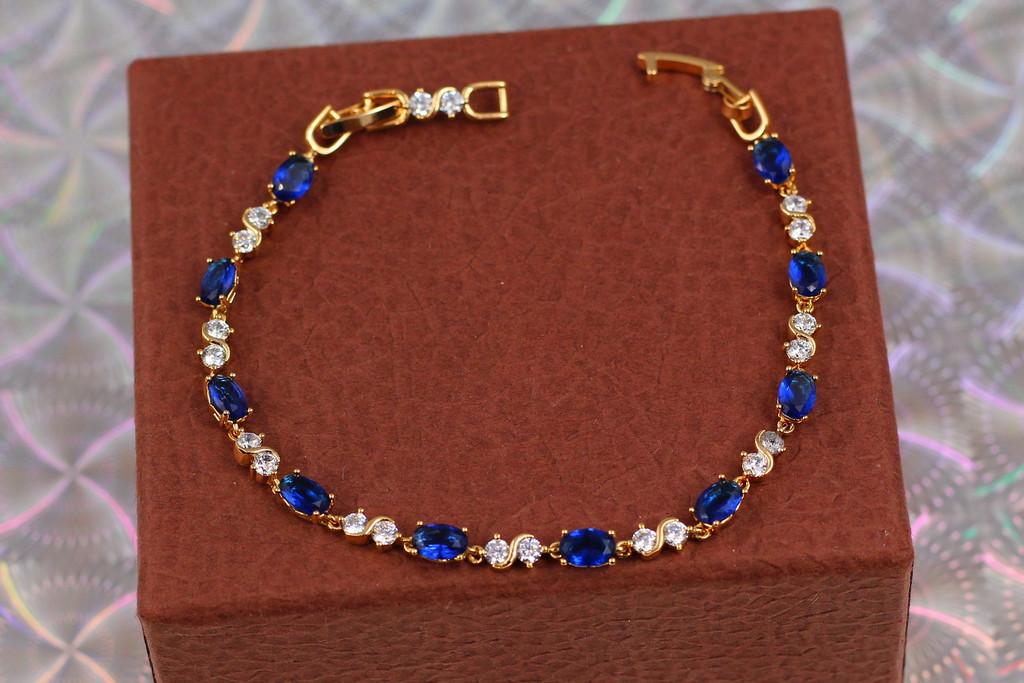 Браслет Xuping Jewelry волна с синими камнями 19 см 4 мм. Золотистый