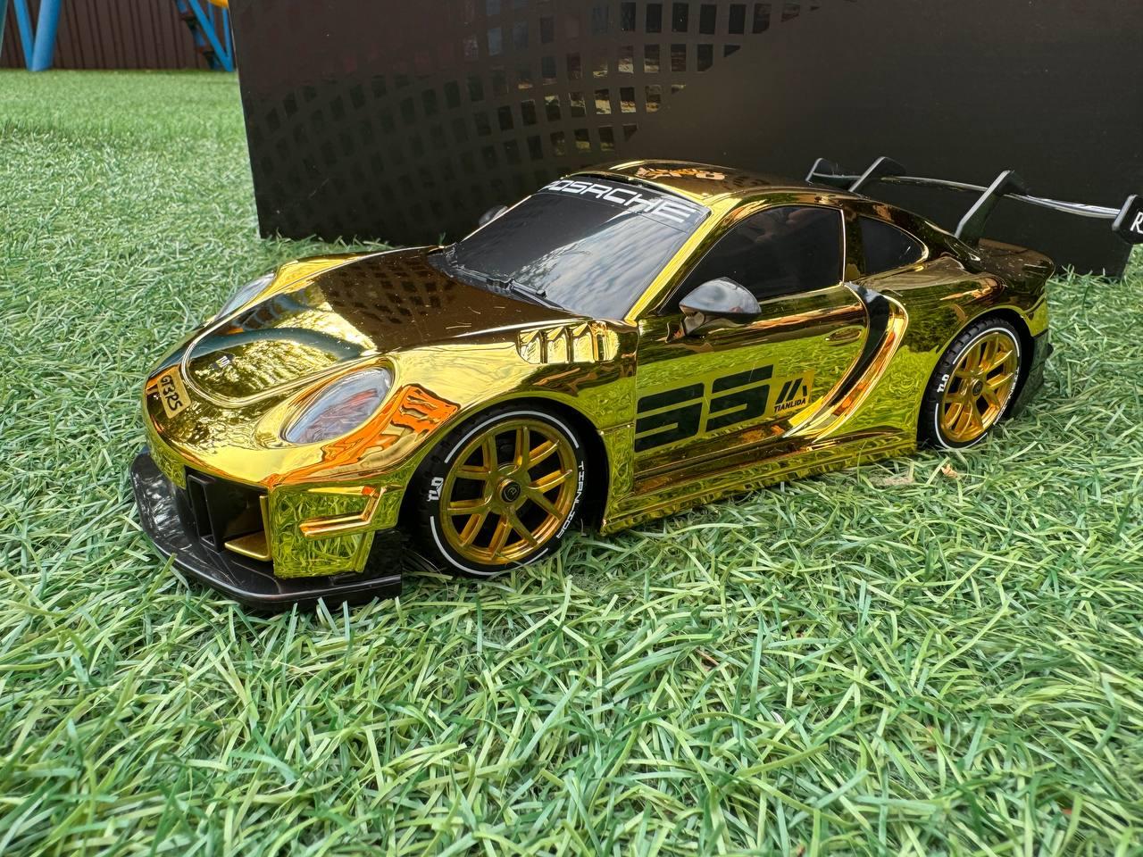 Машинка на радиоуправлении для дрифта Porsche GT3RS 1:18 полноприводная со светодиодной подсветкой Gold (mj3-ibq-f6y) - фото 5 Машинка на радиоуправлении для дрифта Porsche GT3RS 1:18 полноприводная со светодиодной подсветкой Gold (mj3-ibq-f6y) - фото 5