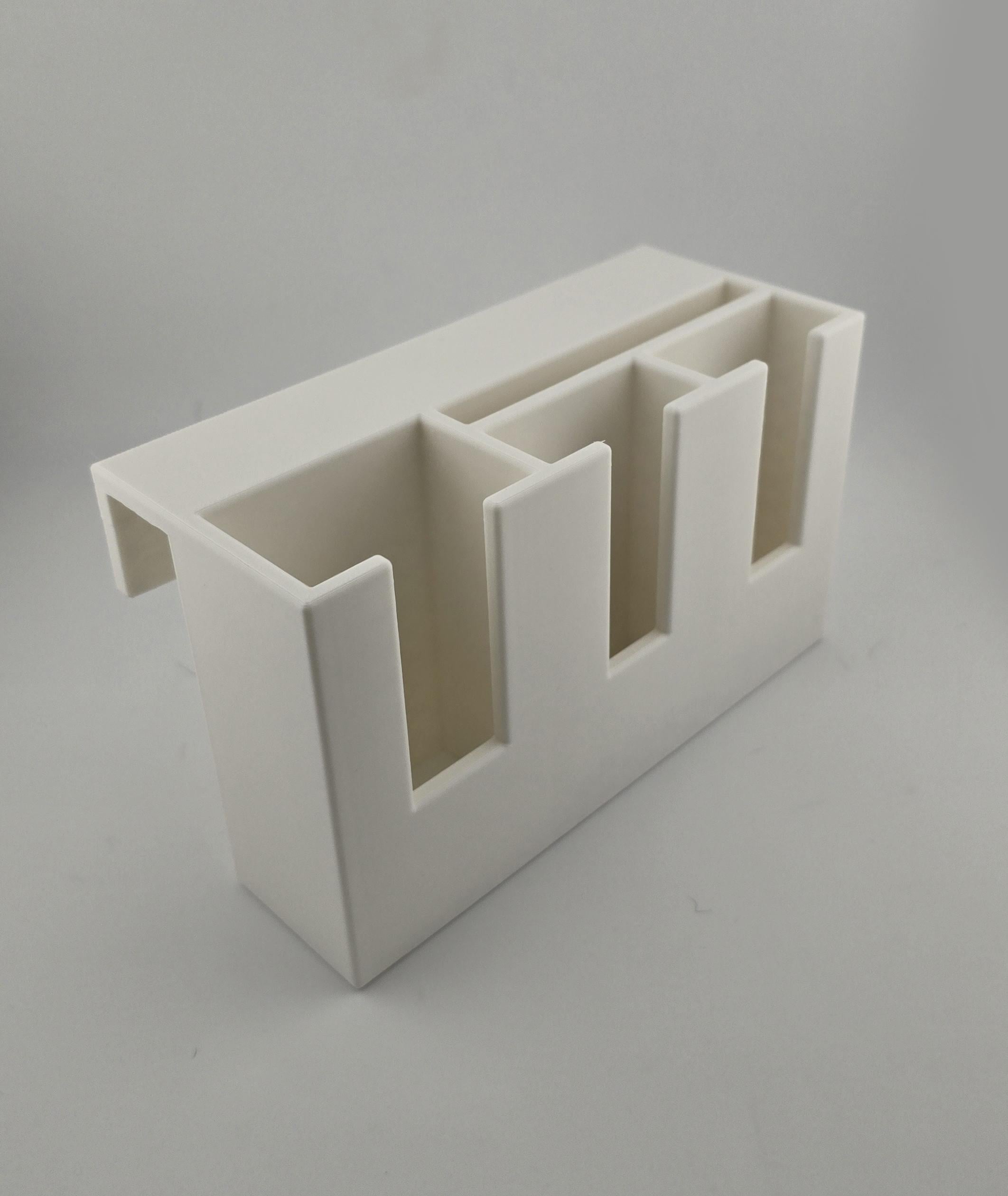 Держатель для пультов и мелочей на 4 отделения с креплением на кровать (0128)