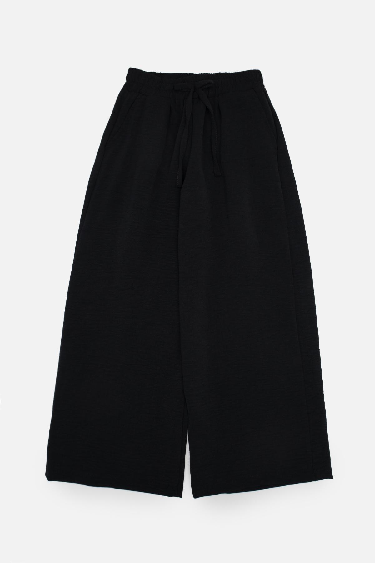 Брюки палаццо для девочки 110 см Черный (SKT000980633)