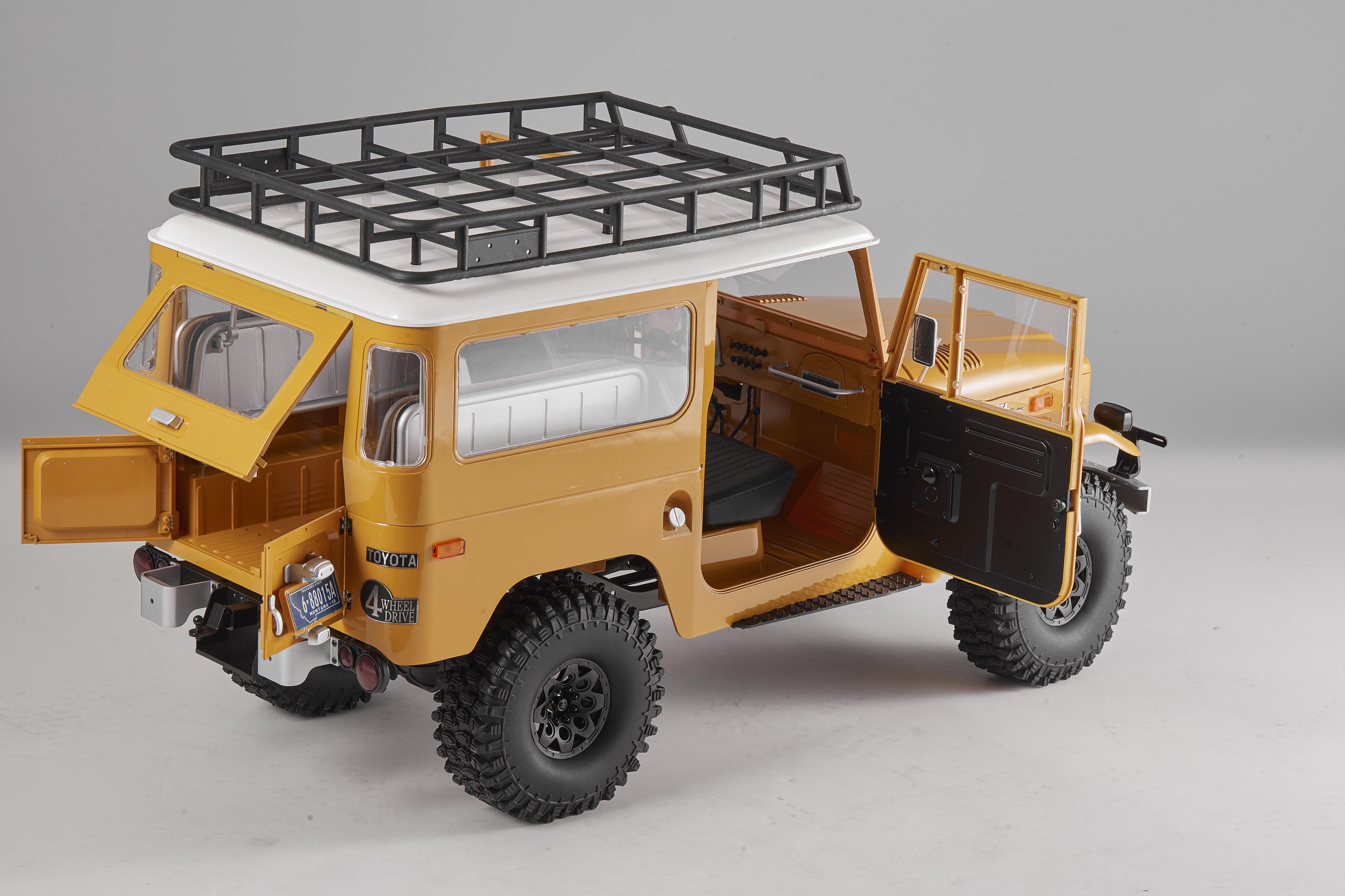 Машинка на радиоуправлении FMS 1:10 Toyota Land Cruiser FJ40 RS Yellow - фото 8 Машинка на радиоуправлении FMS 1:10 Toyota Land Cruiser FJ40 RS Yellow - фото 8