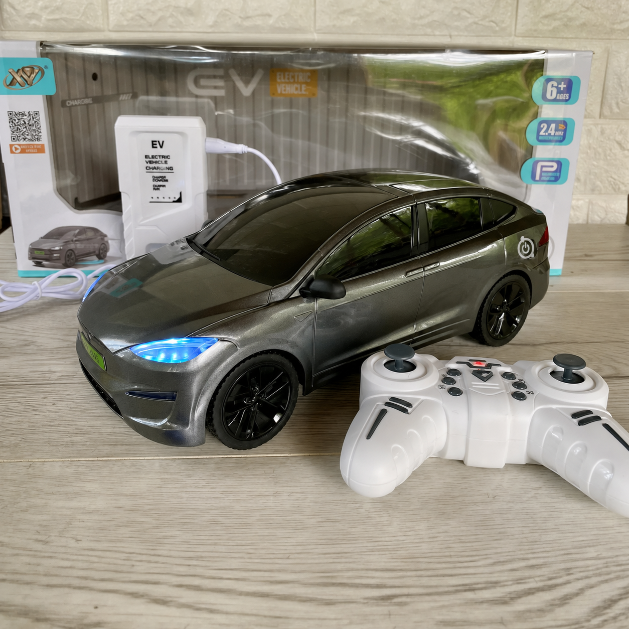 Машинка на радіокеруванні Tesla Model X з зарядною станцією горять фари/звук/парковка 30,5 см Сірий (36822845)