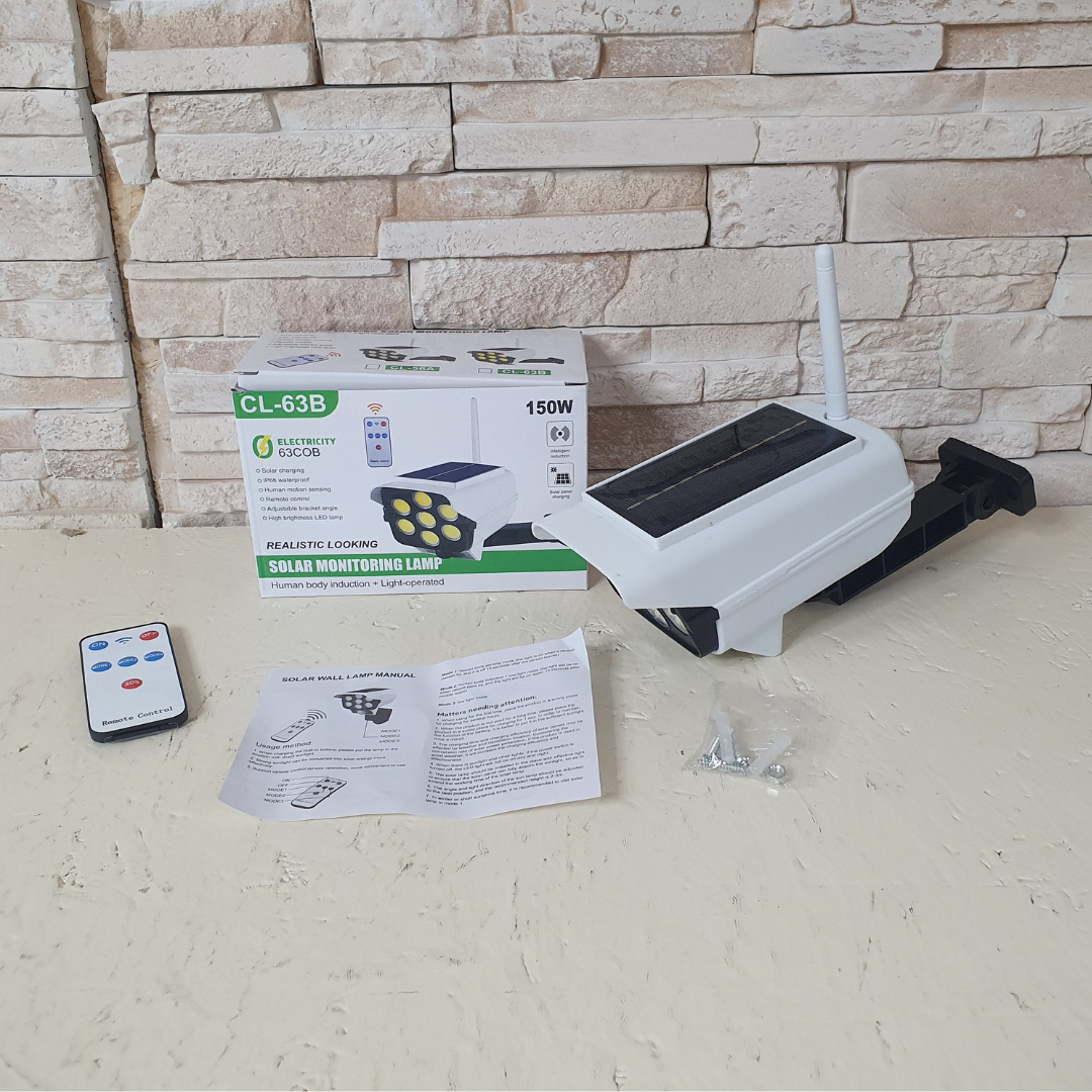 Светильник в виде камеры Solar Monitoring Lamp с датчиком движения и пультом управления (L6A-C5) - фото 10 Светильник в виде камеры Solar Monitoring Lamp с датчиком движения и пультом управления (L6A-C5) - фото 10