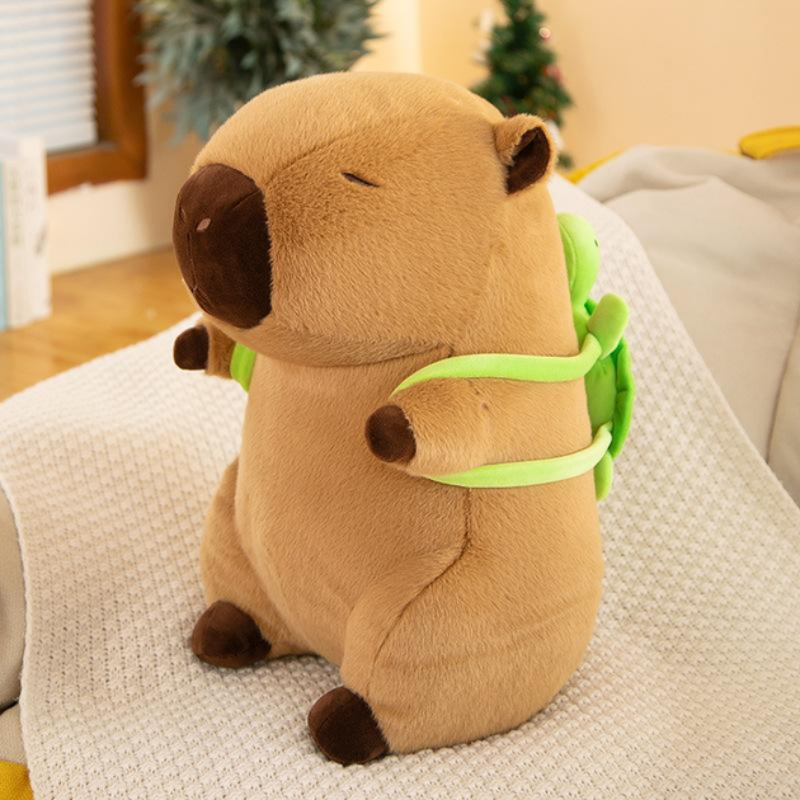 Игрушка мягкая Капибара сидящий с рюкзаком ракушка 30 см Коричневый