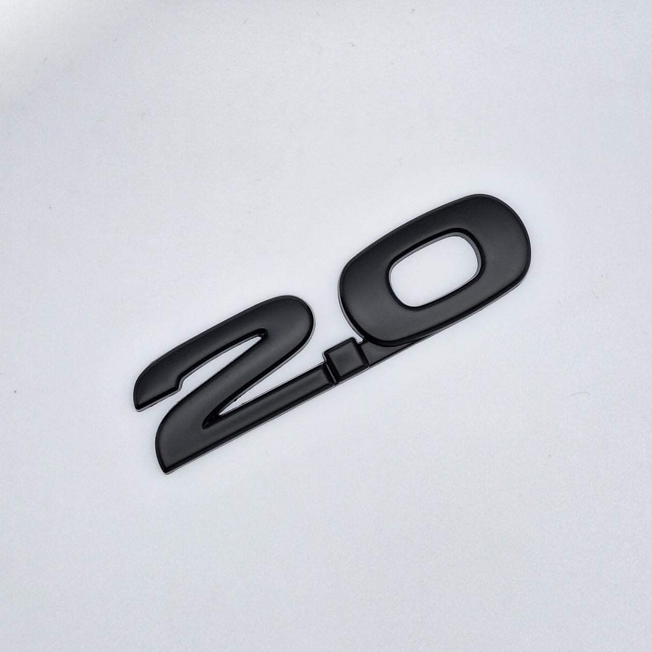 Эмблема надпись 2 Mazda металл Черный матовый (1947853150)