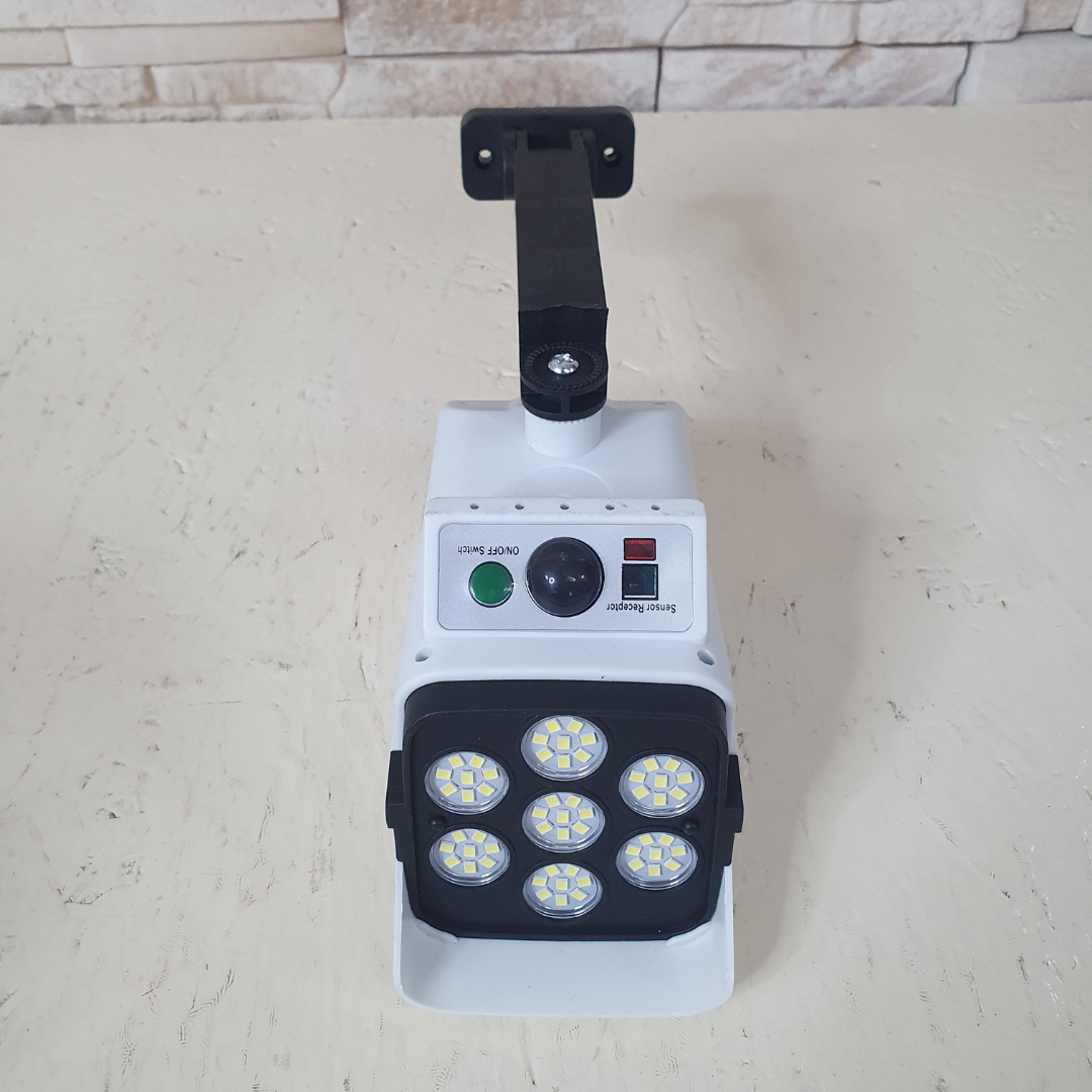 Светильник в виде камеры Solar Monitoring Lamp с датчиком движения и пультом управления (L6A-C5) - фото 5 Светильник в виде камеры Solar Monitoring Lamp с датчиком движения и пультом управления (L6A-C5) - фото 5